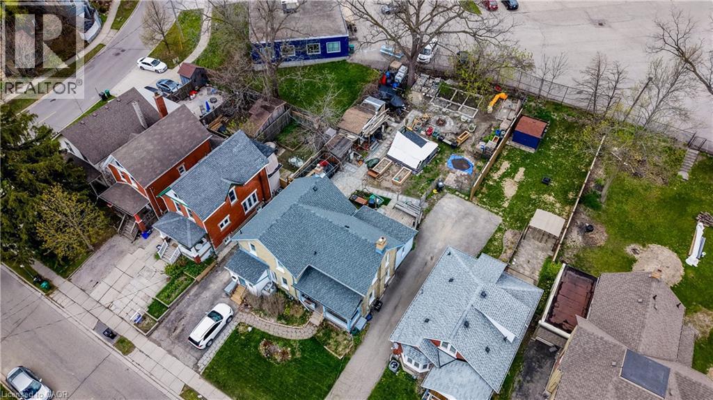Aerial perspective showcasing residential properties with established landscaping and paved driveways - 46 Shanley Street, Kitchener, ON - Outdoor With View