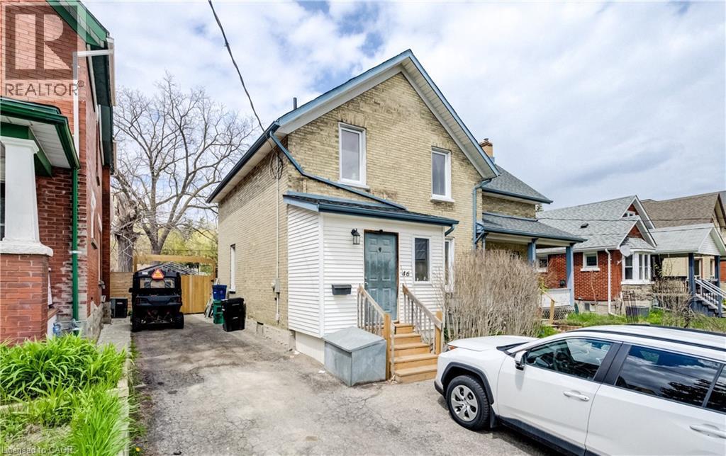 Brick exterior with white trim - 46 Shanley Street, Kitchener, ON - Outdoor