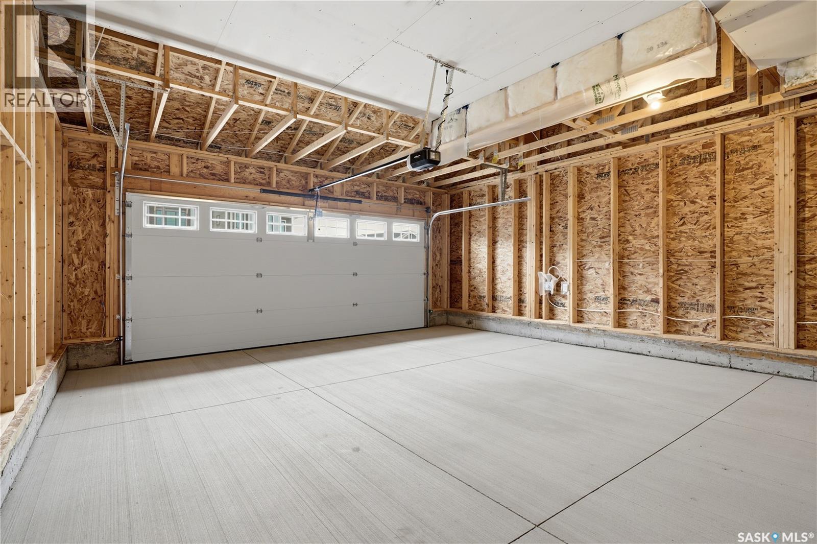 3180 Favel Drive, Regina, SK - Indoor Photo Showing Garage
