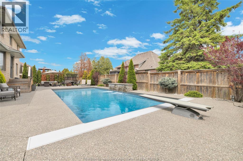 2048 Eugeni, Tecumseh, ON - Outdoor With In Ground Pool