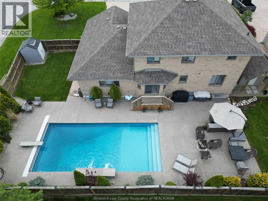 2048 Eugeni, Tecumseh, ON - Outdoor With In Ground Pool