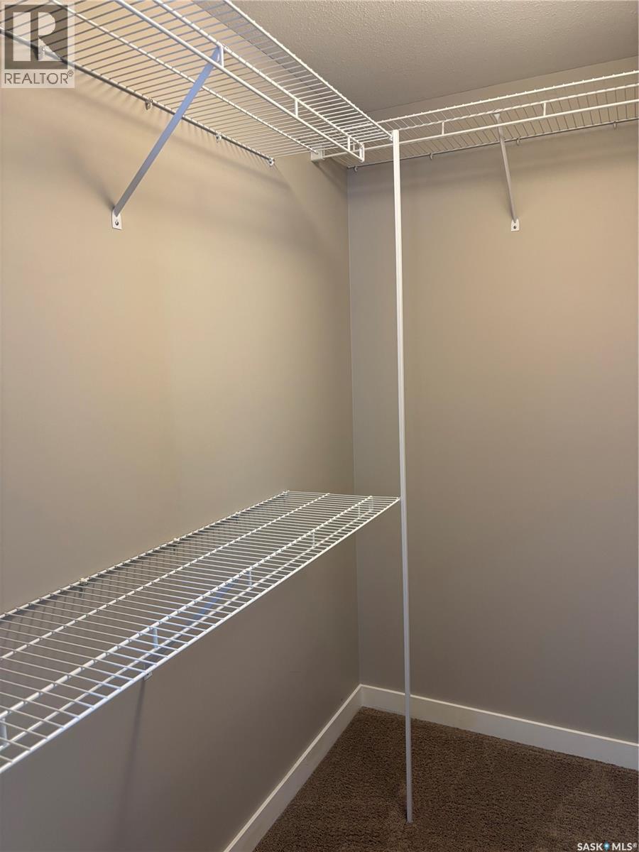 4501 Green Poplar Lane E, Regina, SK - Indoor With Storage