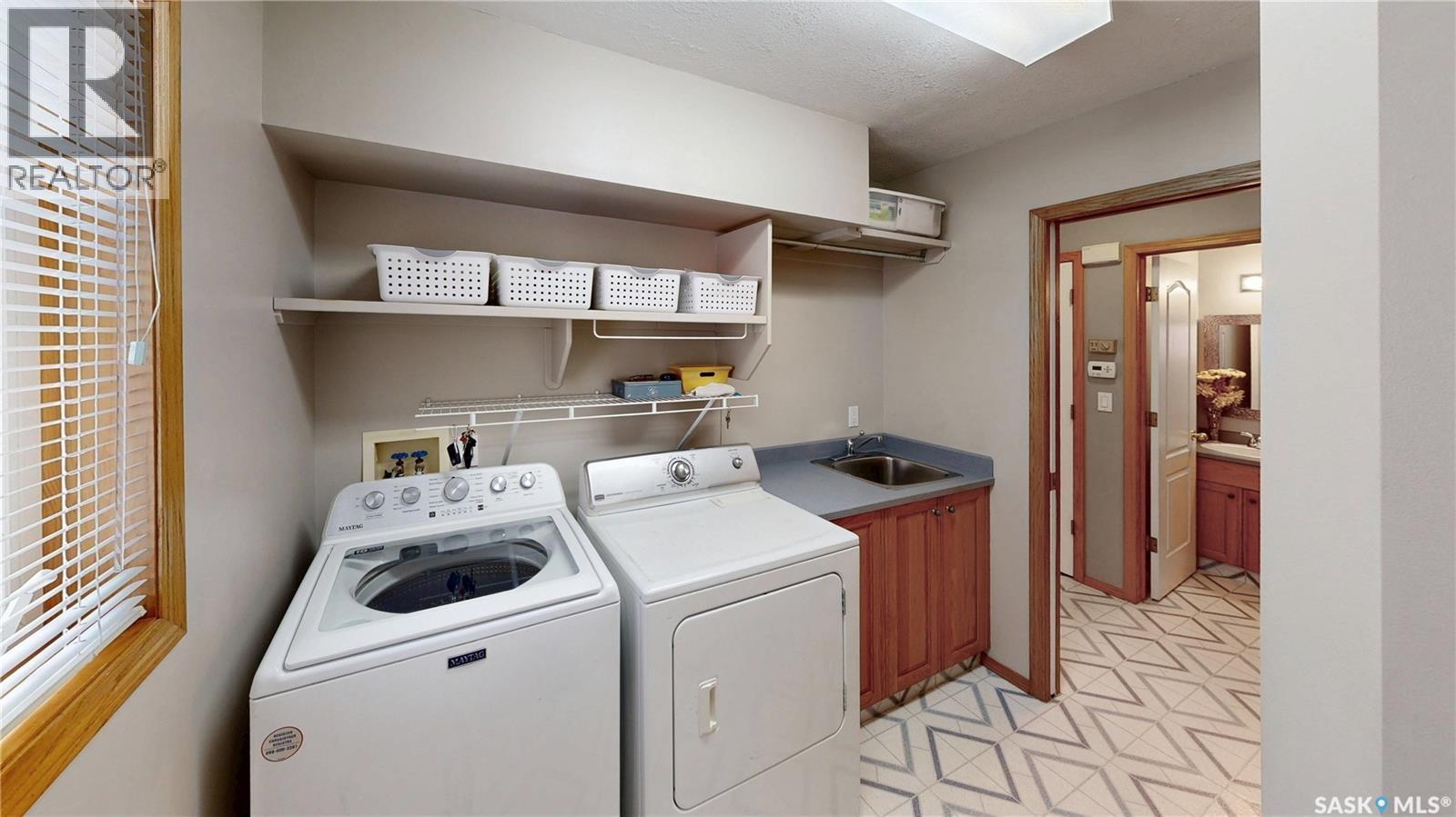 3254 Peyson Bay E, Regina, SK - Indoor Photo Showing Laundry Room