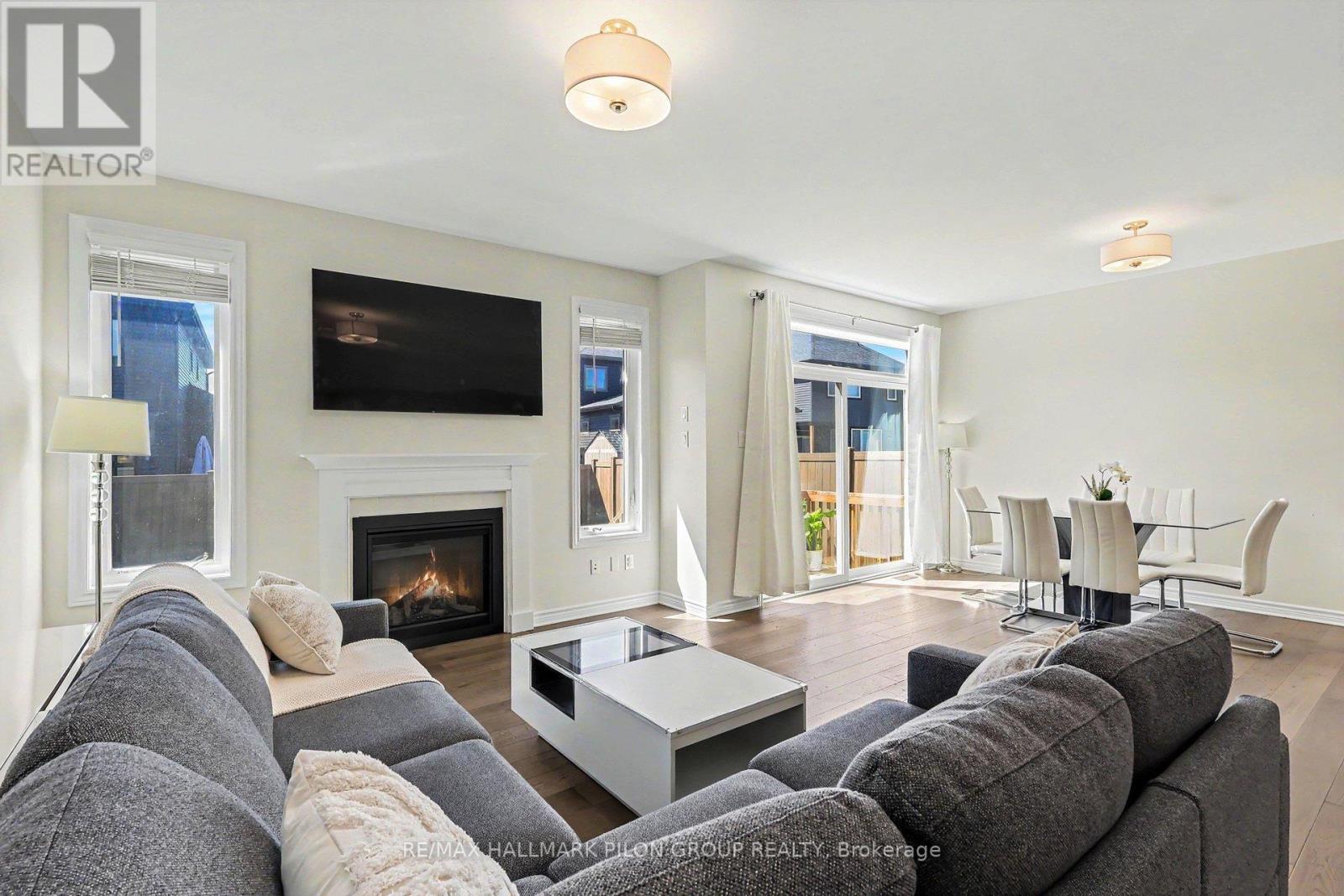 396 Ventoux Avenue, Ottawa, ON - Indoor Photo Showing Living Room With Fireplace