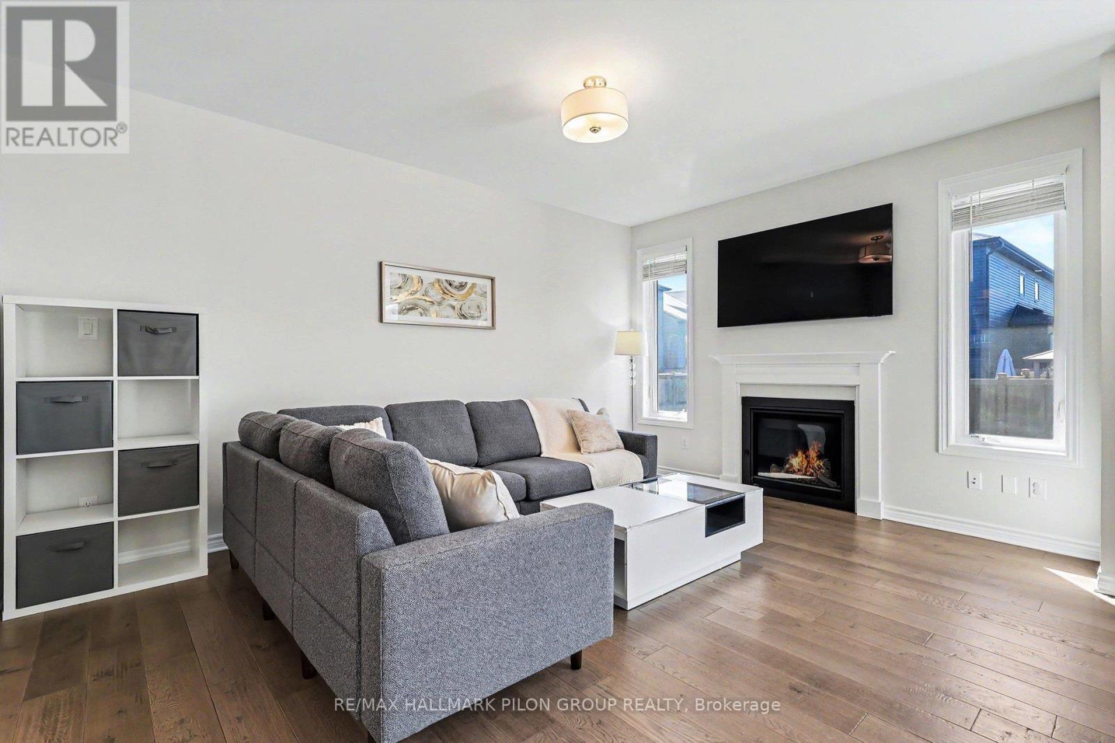 396 Ventoux Avenue, Ottawa, ON - Indoor Photo Showing Living Room With Fireplace