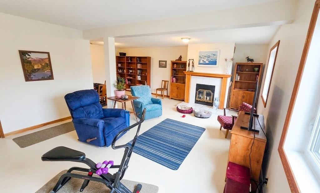 227 Transmitter Road, Kenora, ON - Indoor Photo Showing Living Room With Fireplace