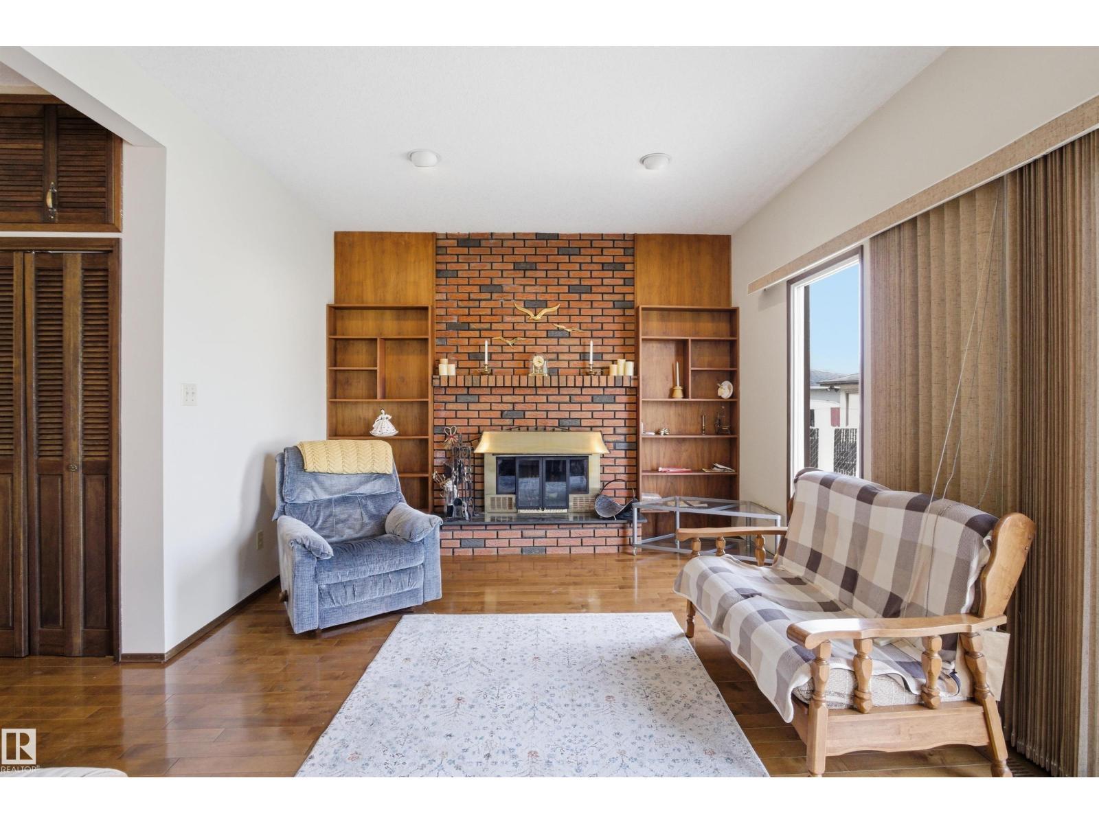 13222 116 St Nw, Edmonton, AB - Indoor Photo Showing Living Room With Fireplace