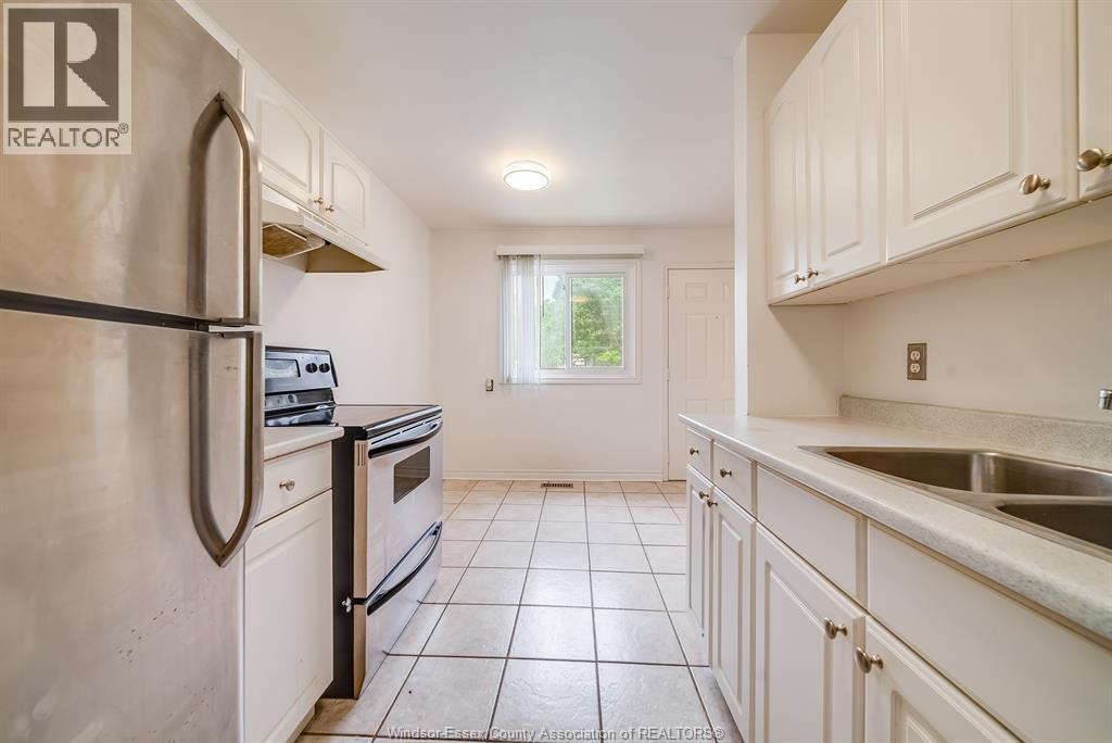 5486 Lassaline, Windsor, ON - Indoor Photo Showing Kitchen With Double Sink