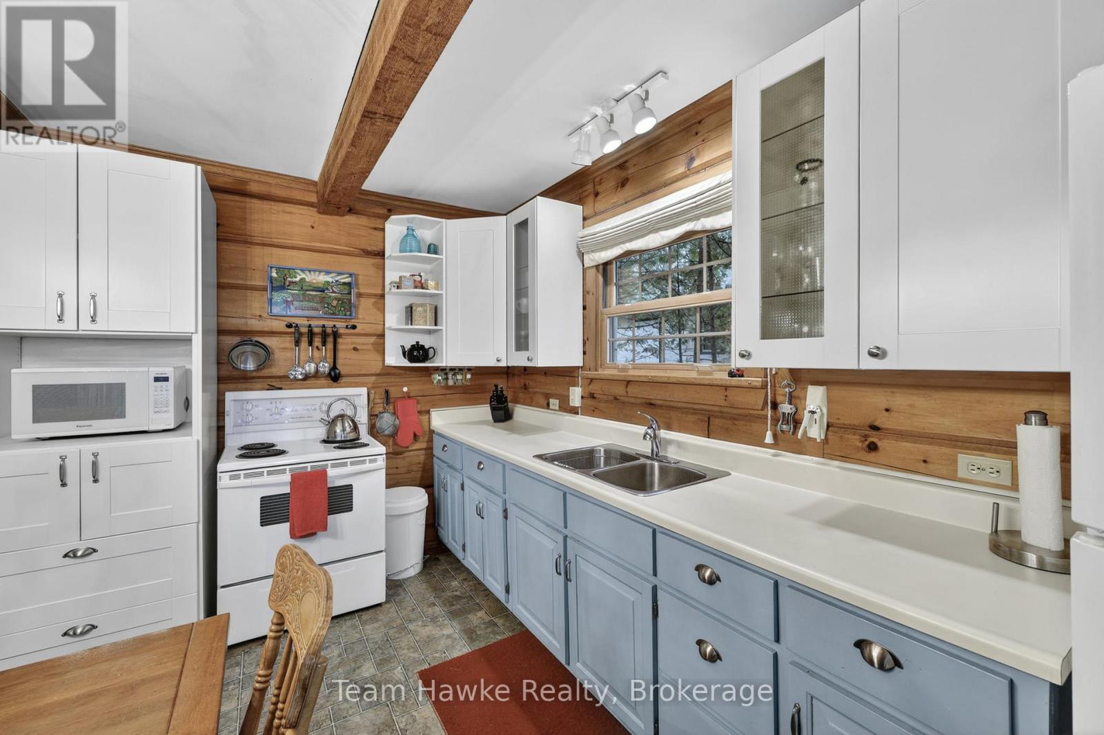 698 Tiny Beaches Road S, Tiny, ON - Indoor Photo Showing Kitchen With Double Sink
