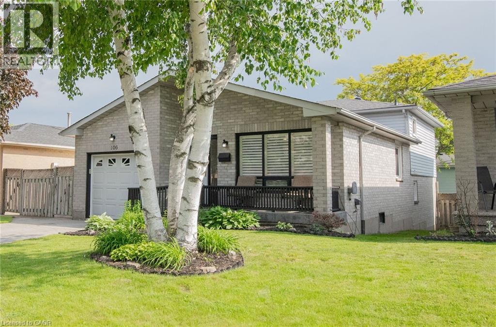 Brick exterior with a single-car garage and a covered porch - 106 Ossington Drive, Hamilton, ON - Outdoor