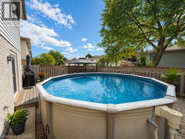 106 Ossington Drive, Hamilton, ON - Outdoor With Above Ground Pool