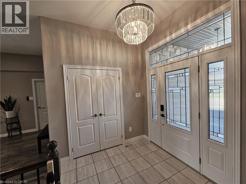 Foyer with overhead transom - 98 Allandale Crescent, Simcoe, ON - Indoor Photo Showing Other Room