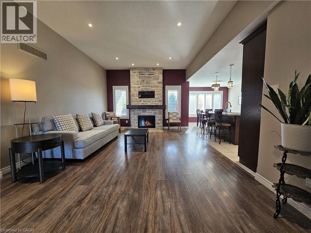 Great Room with gas fireplace - 98 Allandale Crescent, Simcoe, ON - Indoor Photo Showing Living Room With Fireplace