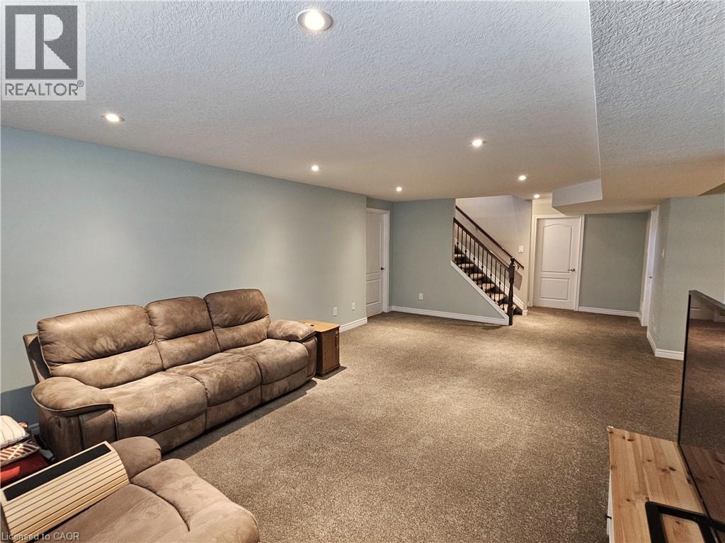 Spacious Family Room - 98 Allandale Crescent, Simcoe, ON - Indoor Photo Showing Other Room