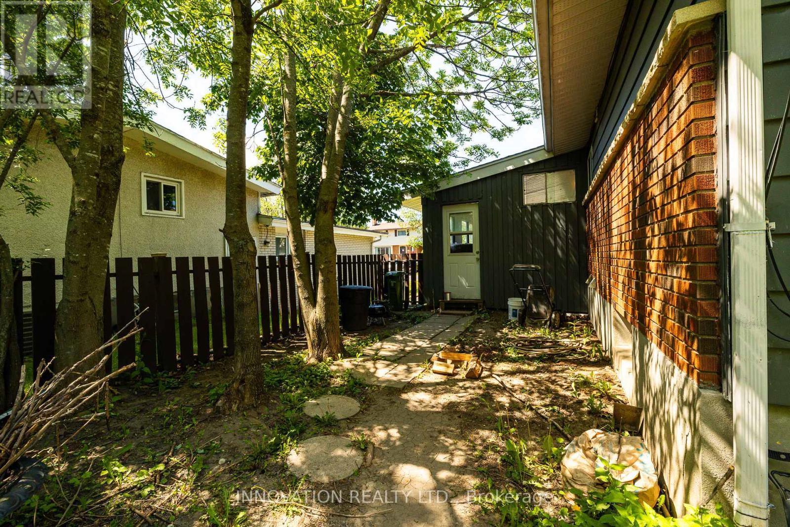 Side yard from Carport - 2329 Ryder Street, Ottawa, ON