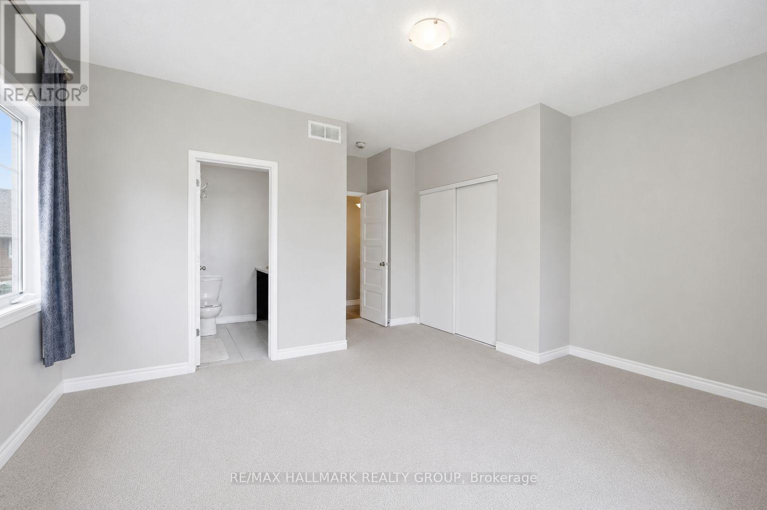SPACIOUS PRIMARY BEDROOM WITH ENSUITE - 670 Danaca Private, Ottawa, ON