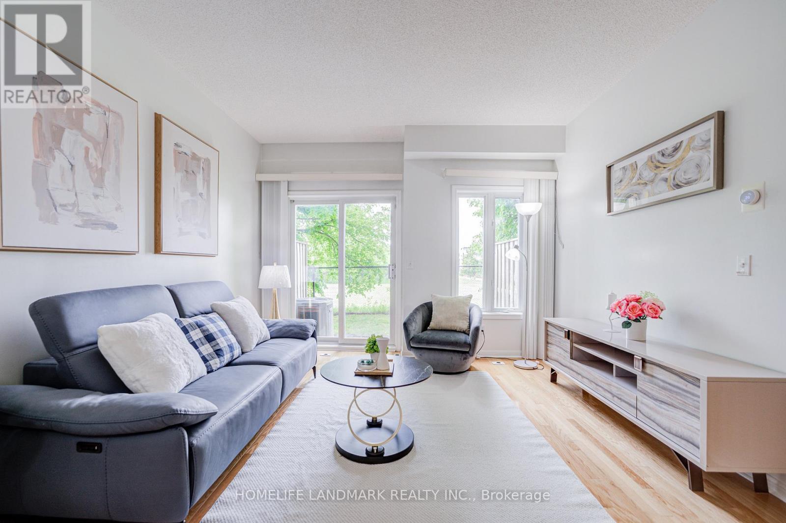 6 - 10 St Moritz Way, Markham, ON - Indoor Photo Showing Living Room