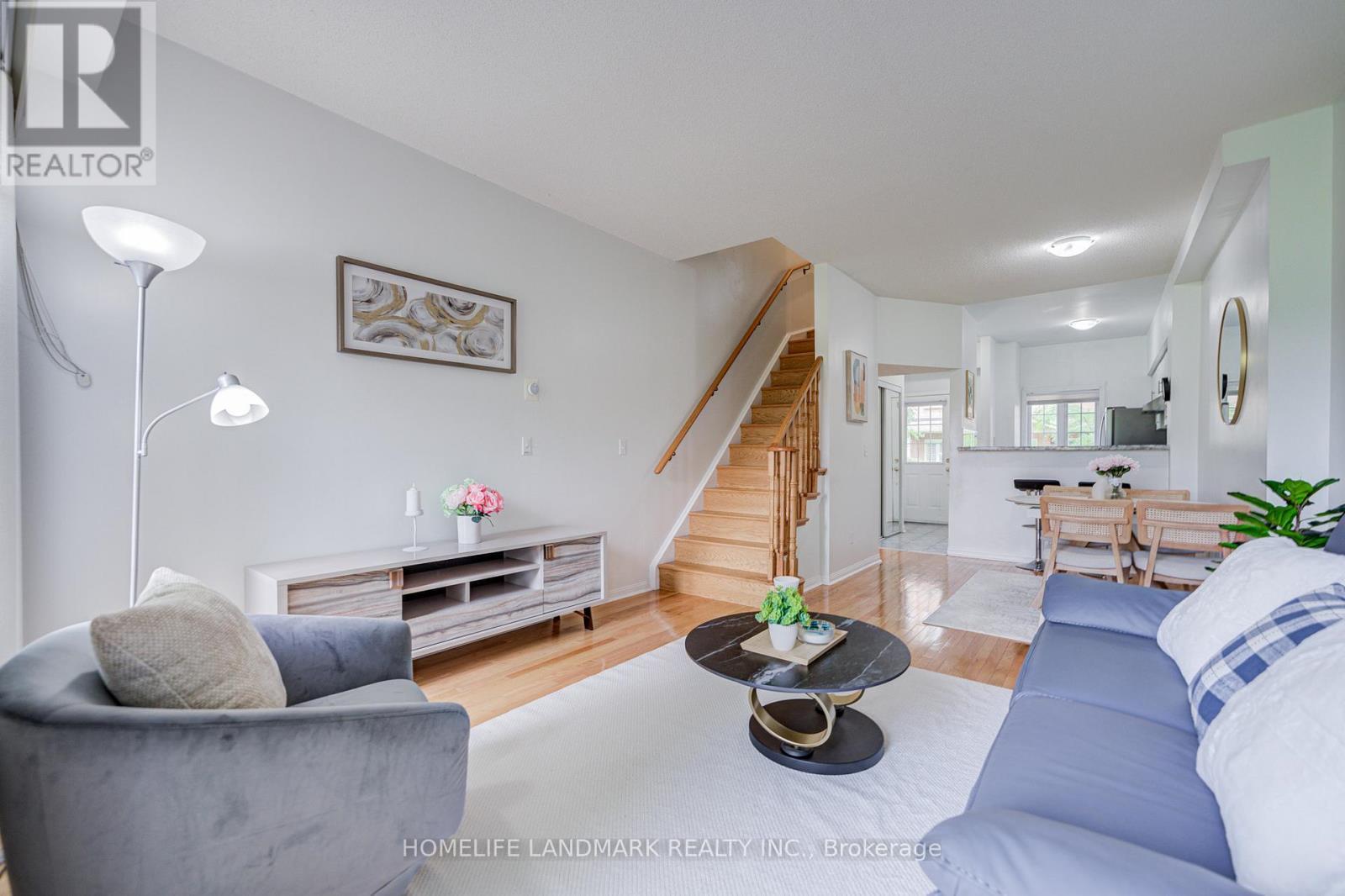 6 - 10 St Moritz Way, Markham, ON - Indoor Photo Showing Living Room