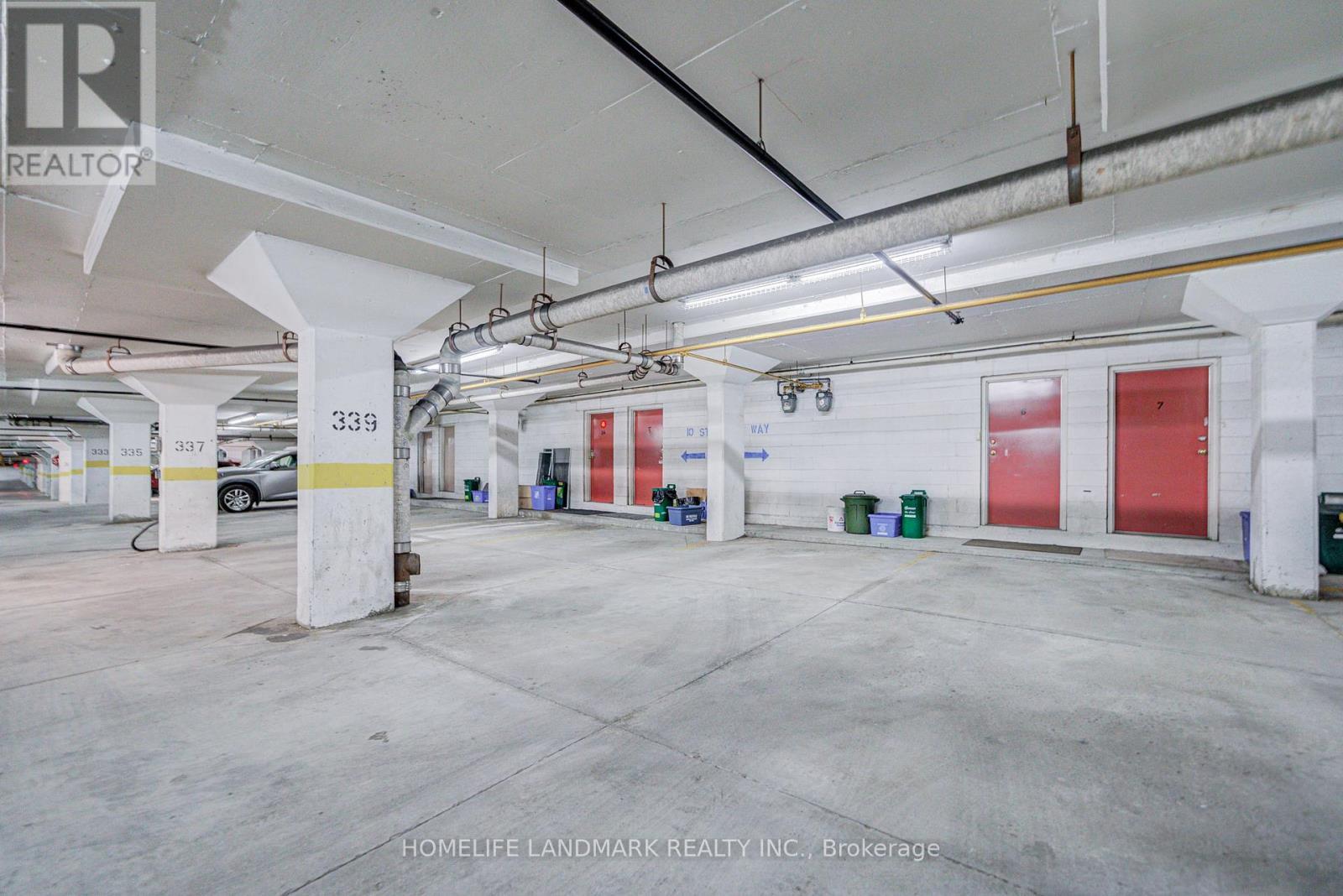6 - 10 St Moritz Way, Markham, ON - Indoor Photo Showing Garage
