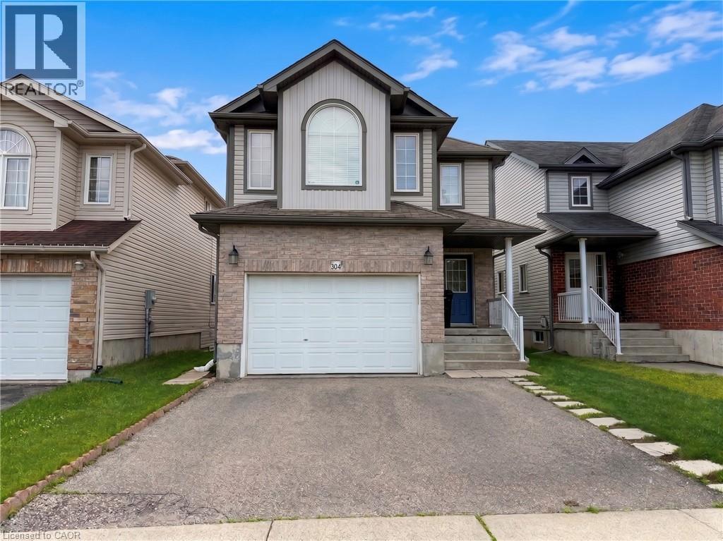 Two-story residence featuring light brick and horizontal siding - 304 Lemon Grass Crescent Unit# B, Kitchener, ON