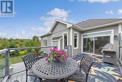 Raised section of deck overlooking pond. - 