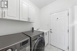 Laundry Room with garage access. - 