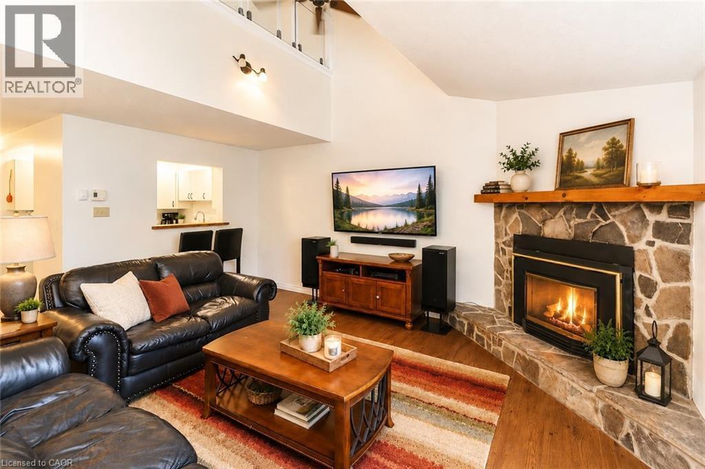 virtual stage - 9 Trafalgar Road, Collingwood, ON - Indoor Photo Showing Living Room With Fireplace