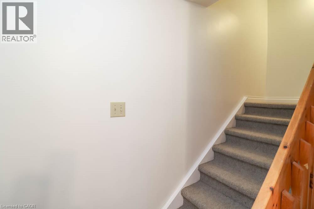 stair to the second level - 9 Trafalgar Road, Collingwood, ON - Indoor Photo Showing Other Room
