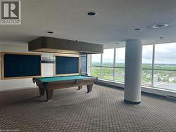 Expansive room featuring wall-to-wall carpeting and large picture windows -