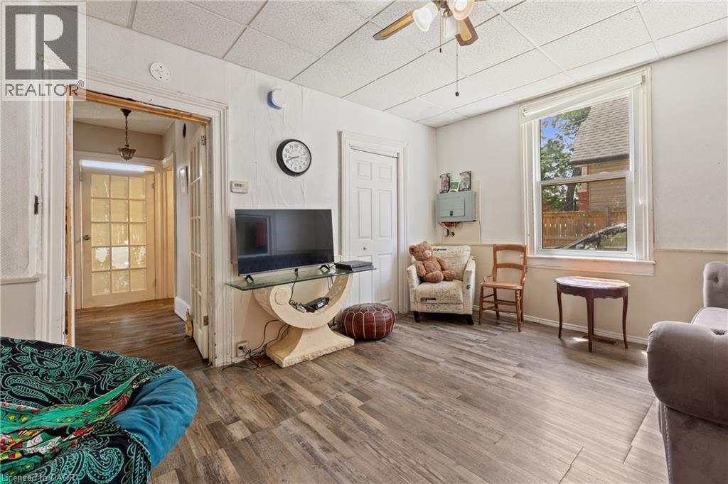 Spacious lounge with neutral decor. - 193 Locke Street N, Hamilton, ON - Indoor
