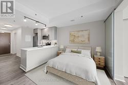 Virtually Staged - Front bedroom configuration. -