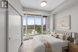 Virtually staged - rear bedroom configuration. -