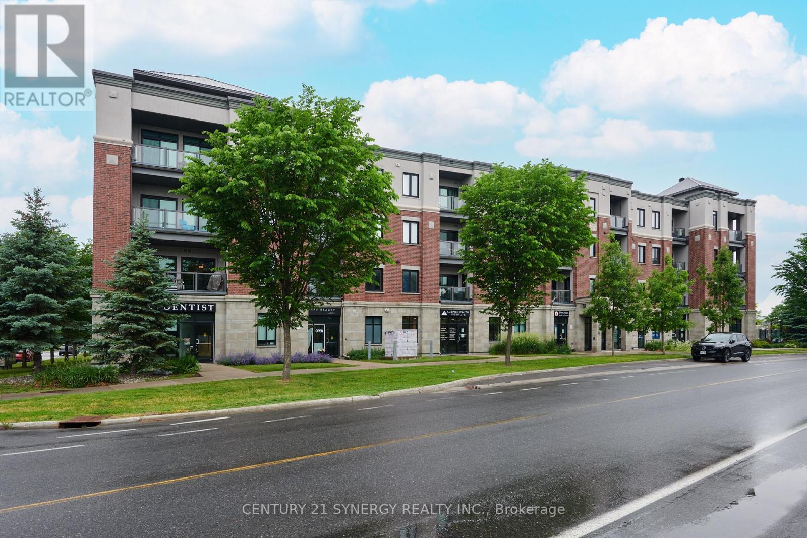201 - 615 Longfields Drive, Ottawa, ON - Outdoor With Balcony With Facade