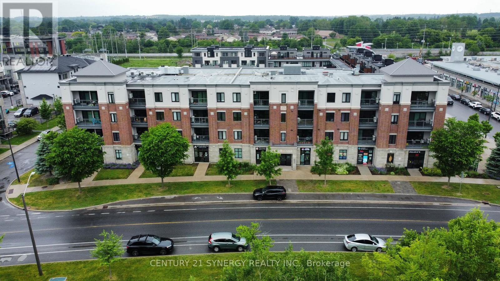 201 - 615 Longfields Drive, Ottawa, ON - Outdoor With Balcony With Facade