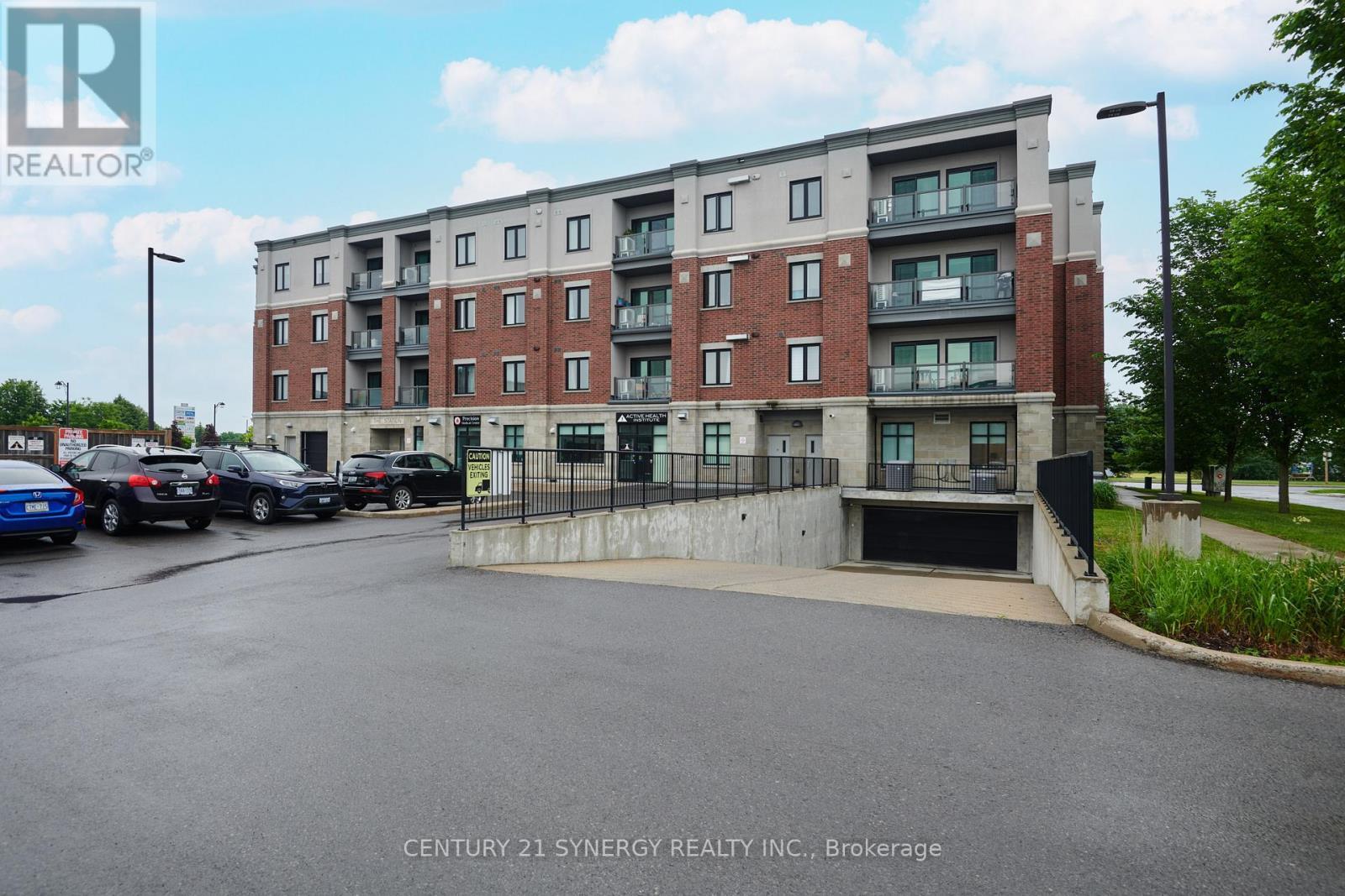 201 - 615 Longfields Drive, Ottawa, ON - Outdoor With Balcony With Facade