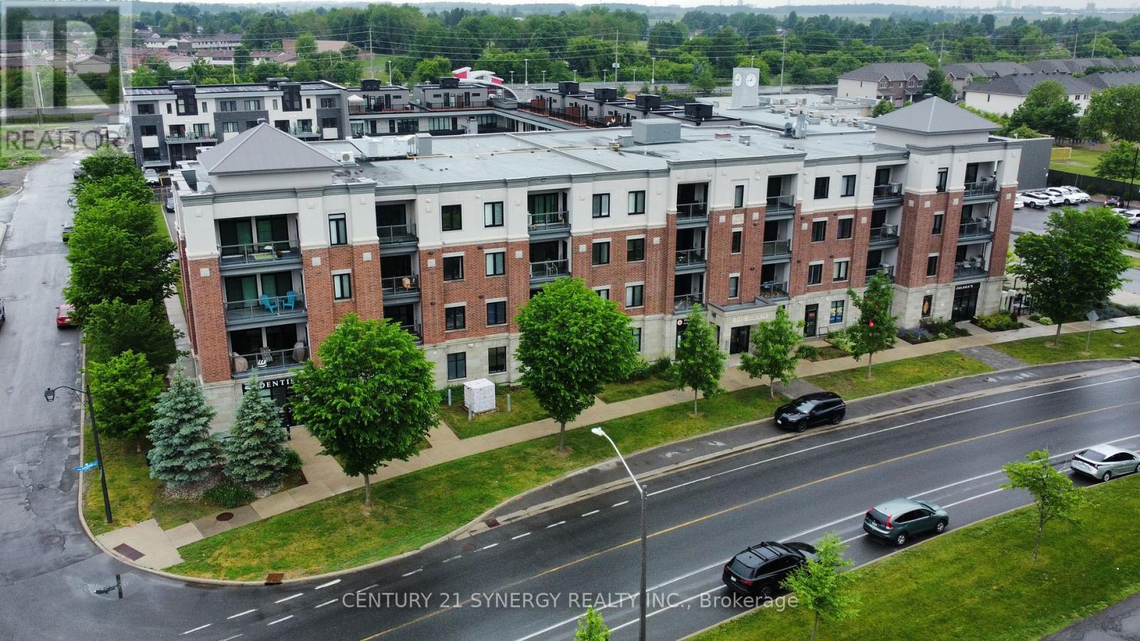 201 - 615 Longfields Drive, Ottawa, ON - Outdoor With Balcony With Facade