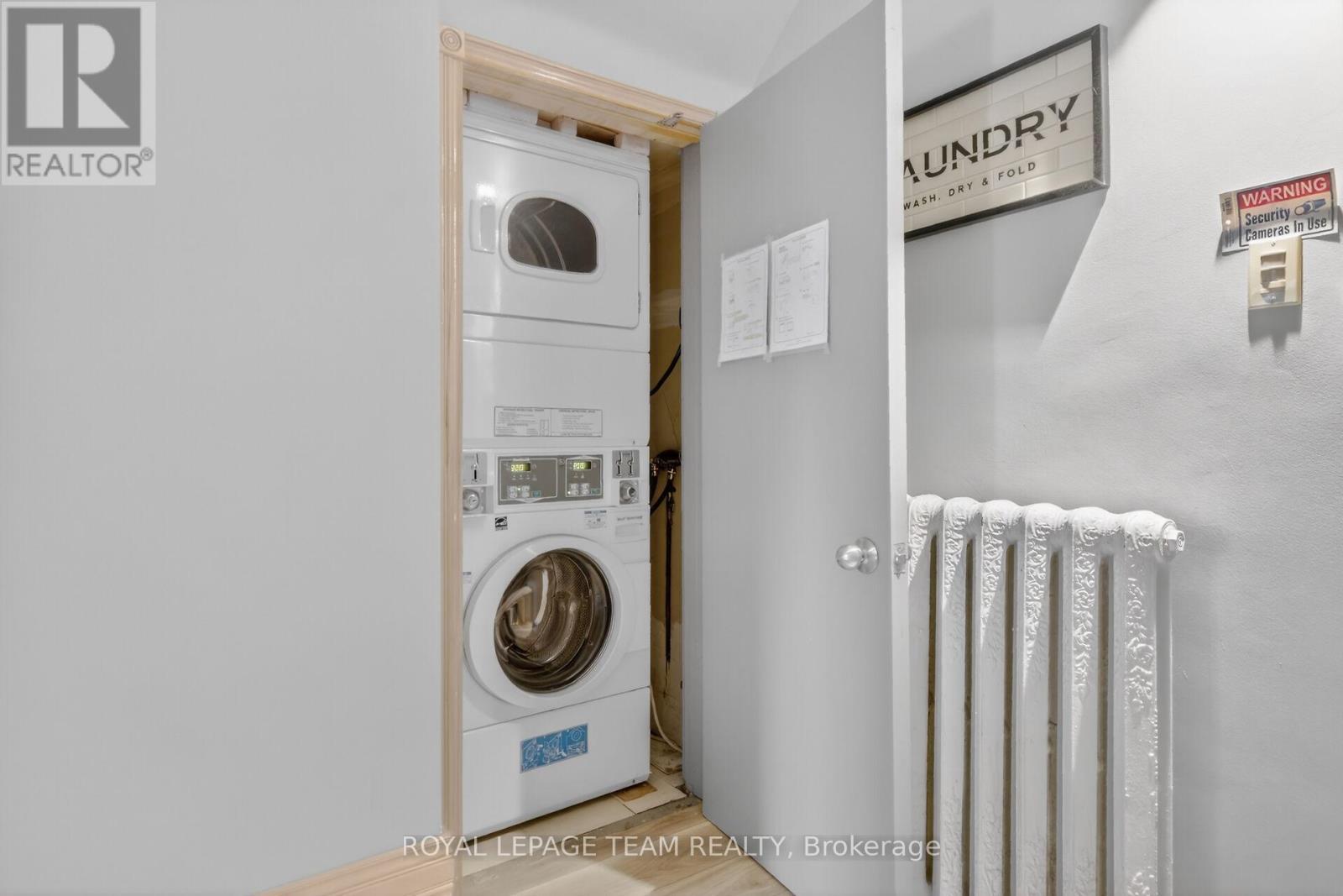 In unit coin operated stacked washer & dryer. - 64 Delaware Avenue S, Ottawa, ON