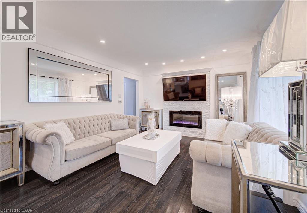 152 Clark Avenue, Kitchener, ON - Indoor Photo Showing Living Room With Fireplace