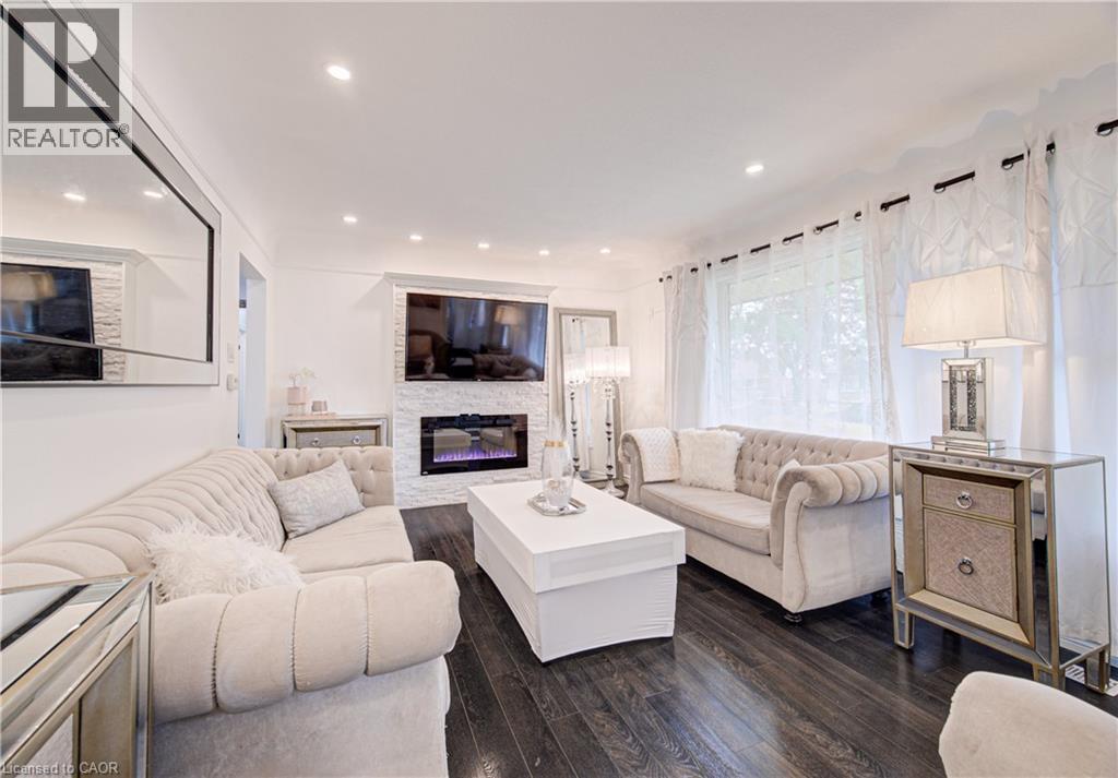 152 Clark Avenue, Kitchener, ON - Indoor Photo Showing Living Room With Fireplace