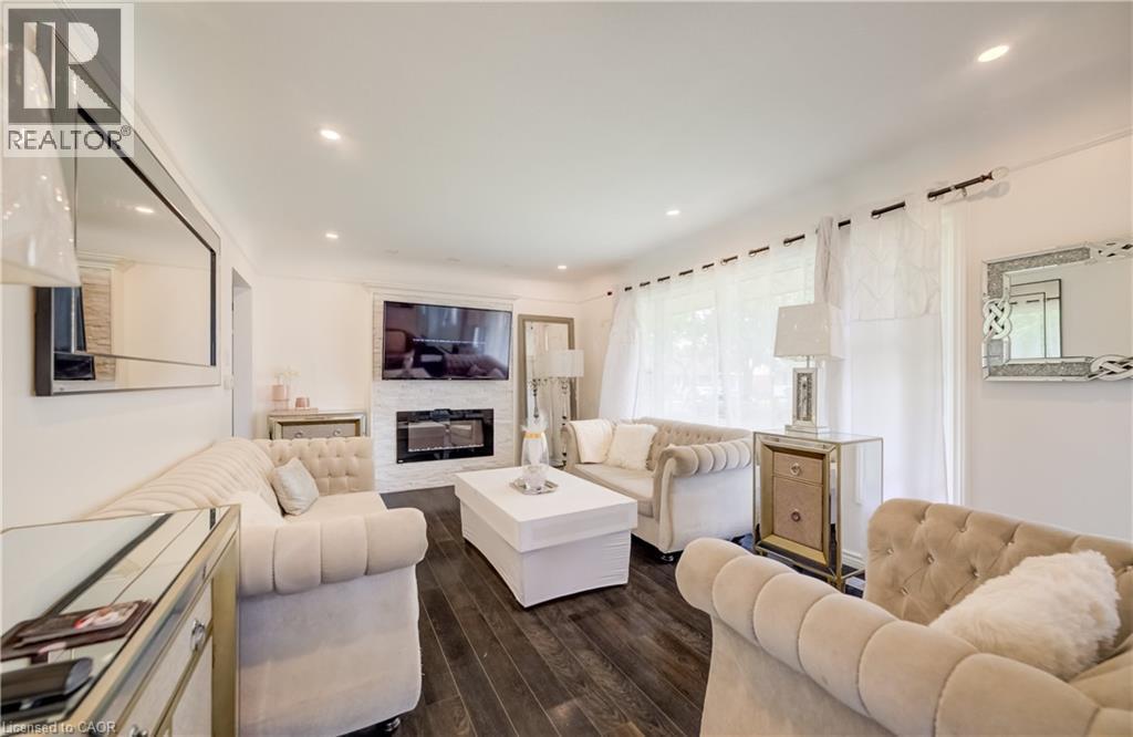 152 Clark Avenue, Kitchener, ON - Indoor Photo Showing Living Room With Fireplace