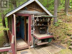 Outbuilding with chemical toilet - 