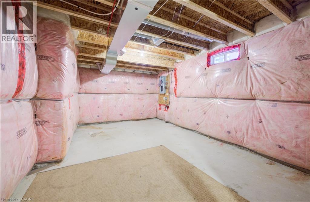 Unfinished below grade area featuring electric panel - 302 Jean Landing, Milton, ON