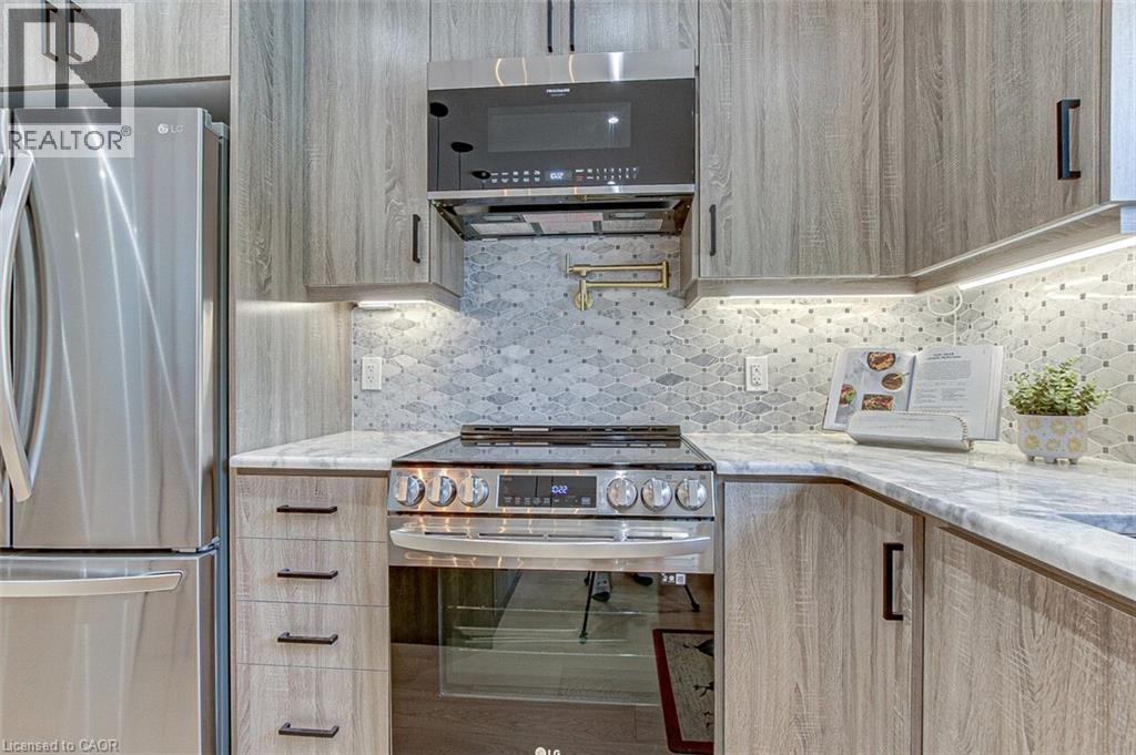 Pot Filler Above Stove - 33 Tyrell Street, Simcoe, ON - Indoor Photo Showing Kitchen With Upgraded Kitchen