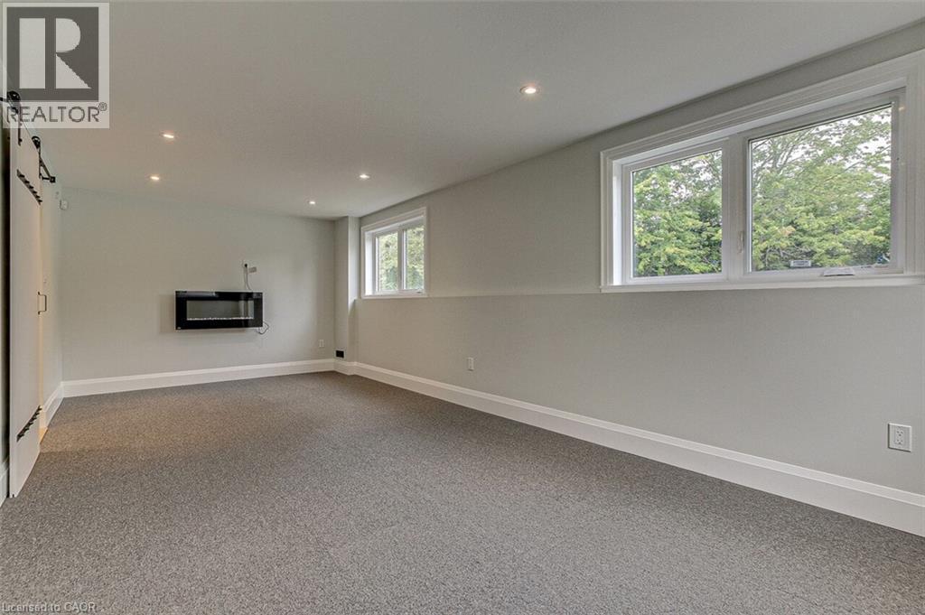 Rec. Room 2 - 33 Tyrell Street, Simcoe, ON - Indoor With Fireplace