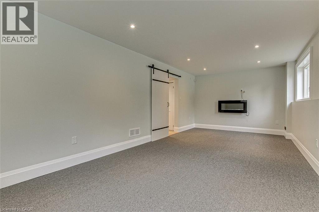 Rec. Room 3 - 33 Tyrell Street, Simcoe, ON - Indoor Photo Showing Other Room With Fireplace