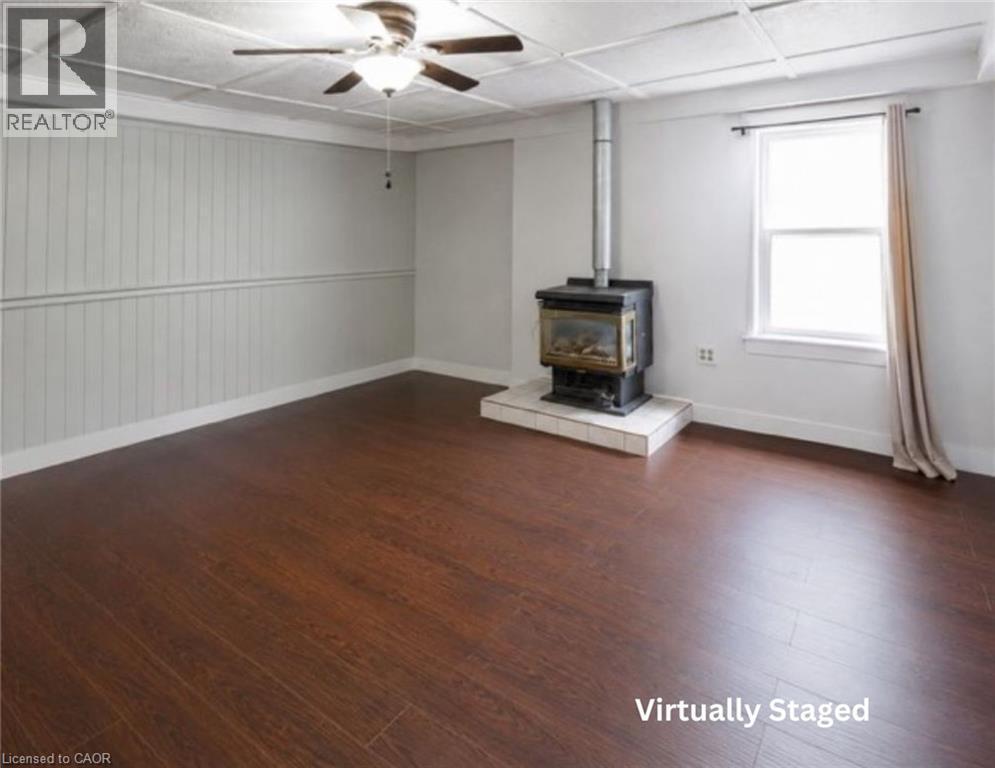 Virtually Staged - 9 Marshall Lane, Simcoe, ON - Indoor With Fireplace