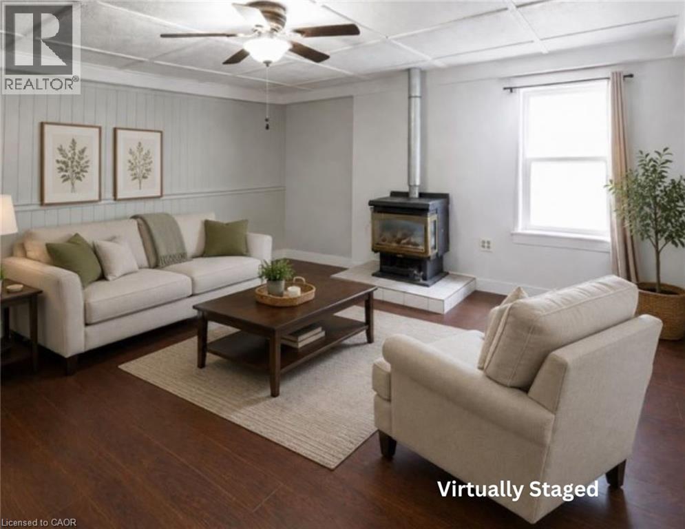 Virtually Staged - 9 Marshall Lane, Simcoe, ON - Indoor Photo Showing Living Room With Fireplace