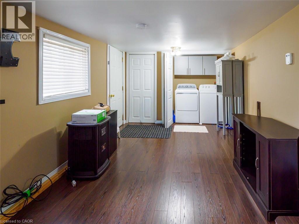 Second bedroom or family room - door to back deck - 9 Marshall Lane, Simcoe, ON - Indoor
