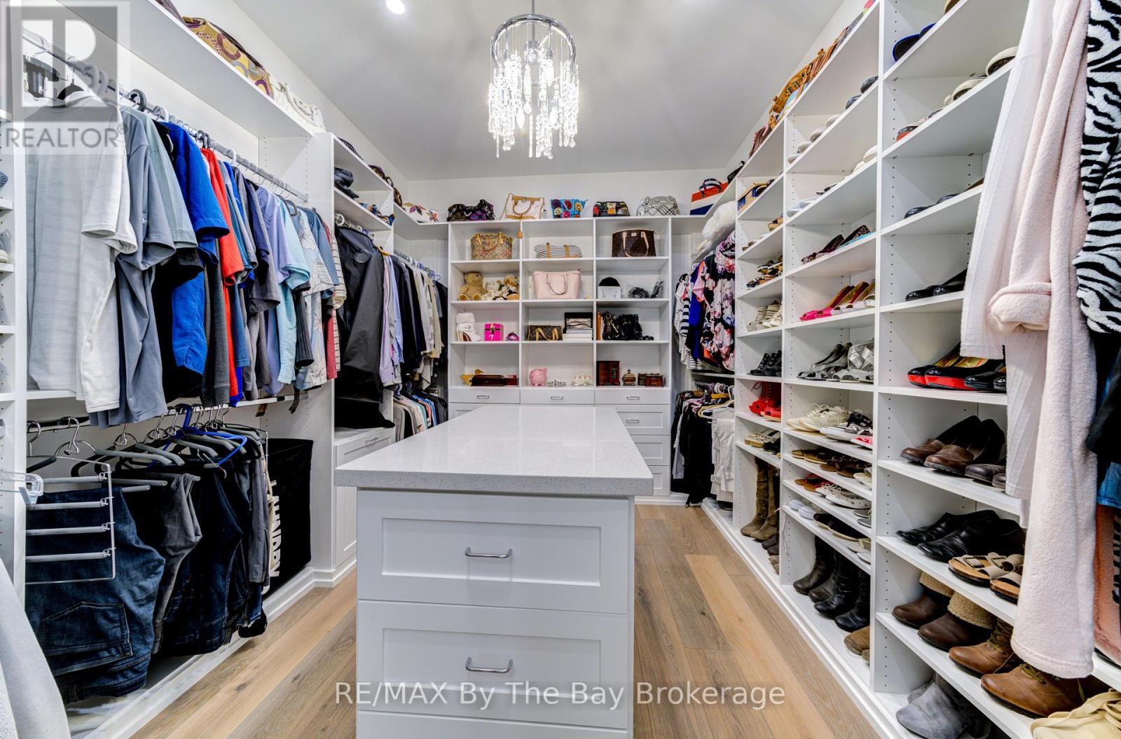 Primary Bedroom Walk in Closet - 95 Spruce Street, Tiny, ON