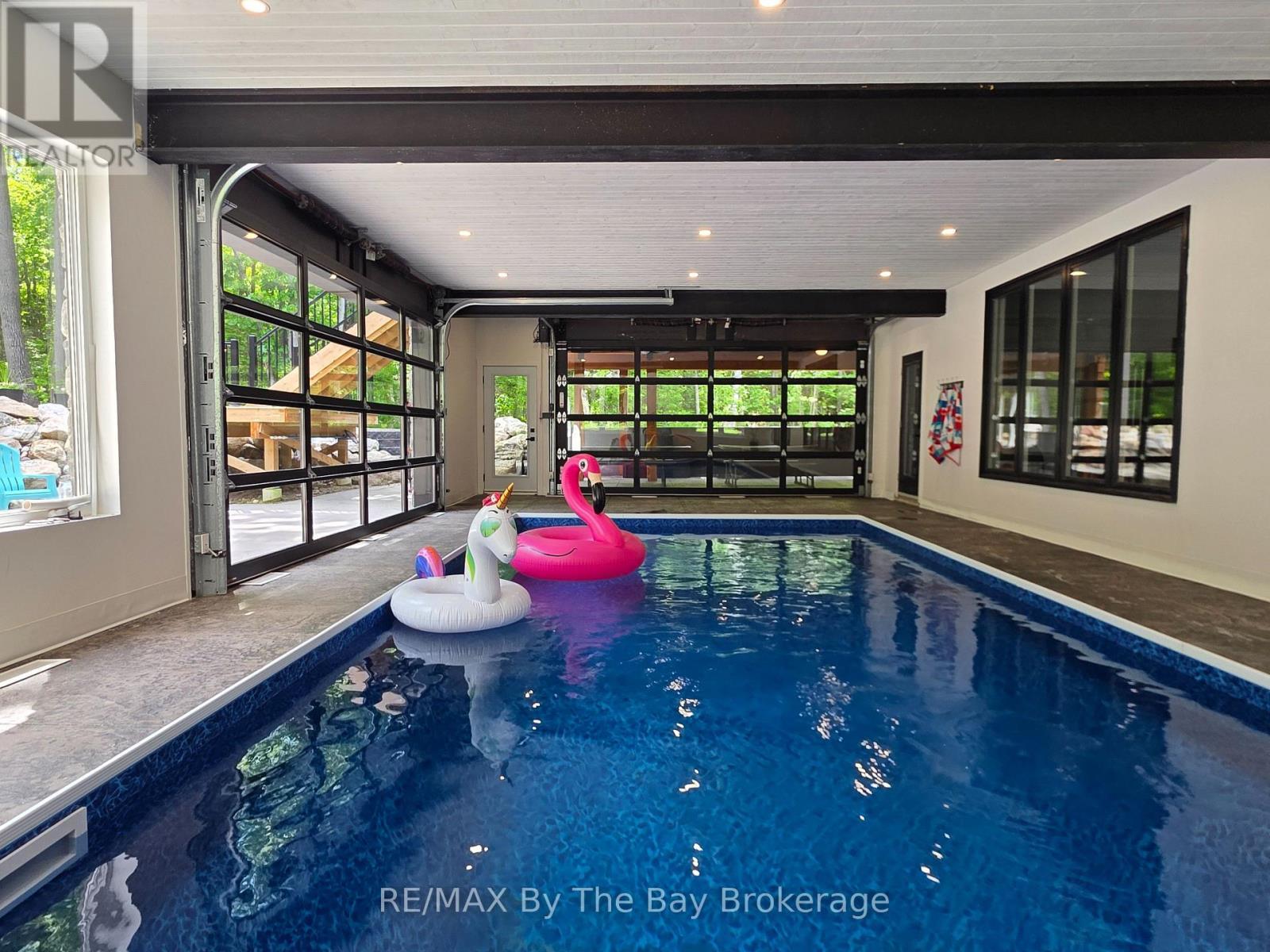 Indoor/Outdoor Pool Area - Doors Closed - 95 Spruce Street, Tiny, ON